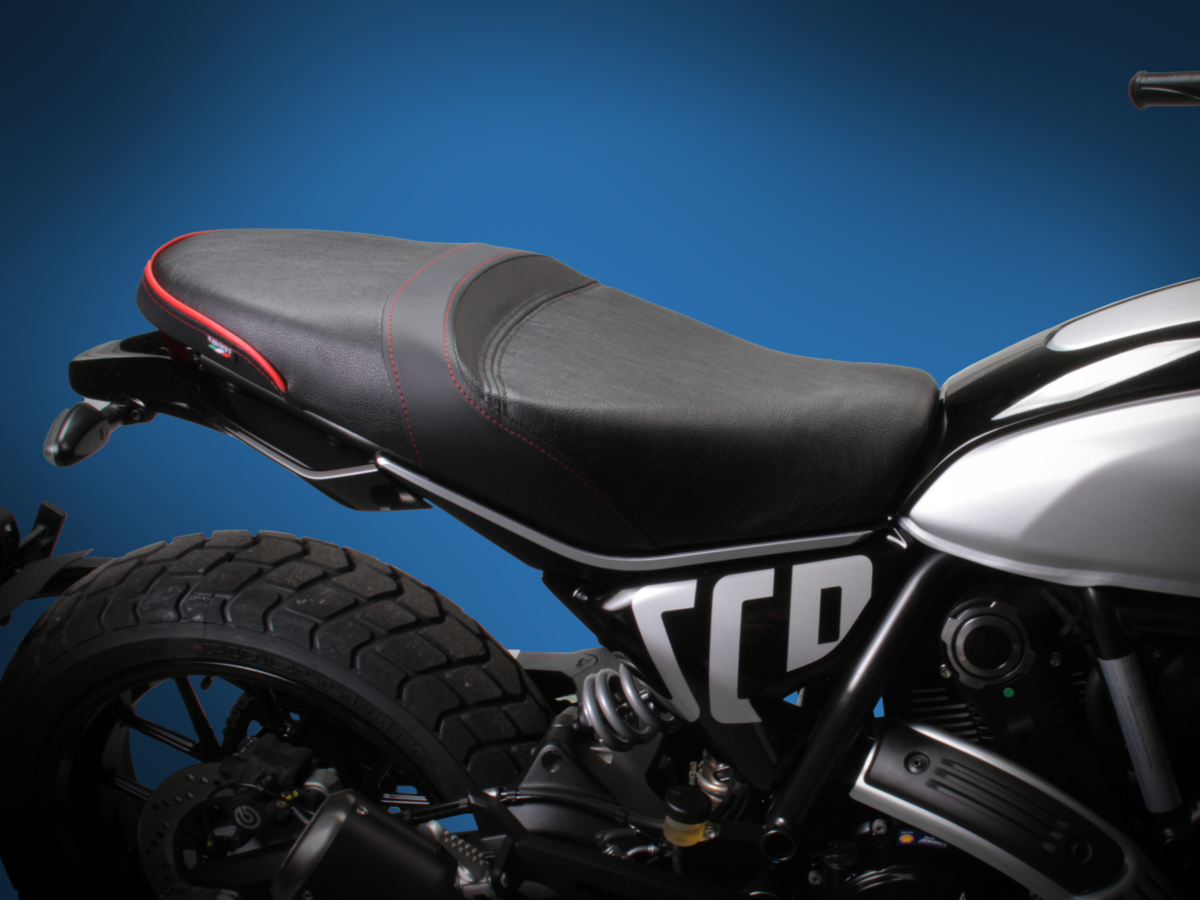 Sargent World Sport Motorcycle Seat on the 2023+ Ducati Scrambler bike with Red Accents Two-Up Style - available with custom upholstery options.